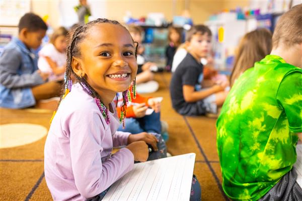 Students inside their classrooms learning. 